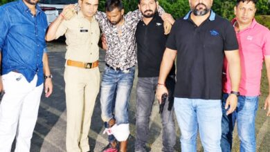 Shot in both legs during police retaliation; stolen Fortuner recovered; accomplice absconding.